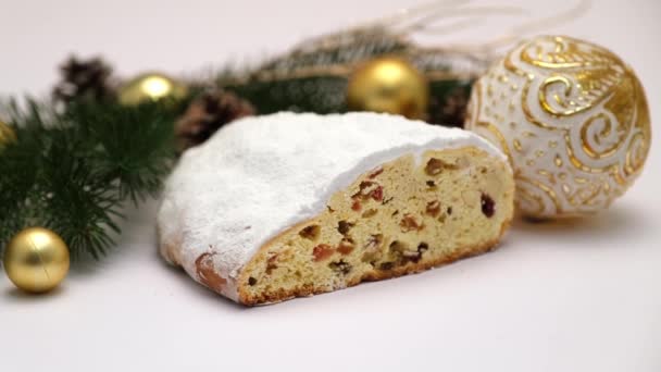 Sliced Traditional Christmas stollen cake with marzipan and dried fruit — Stock Video