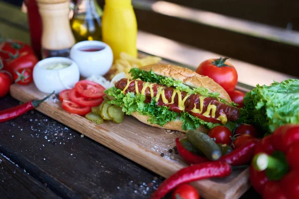 Bbq Hot Dog Served Vegetables French Fries Sauces Wooden Serving — Stock Photo, Image