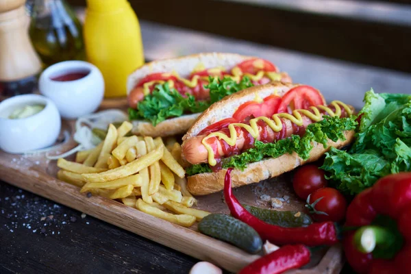 Bbq Hot Dog Served Vegetables French Fries Sauces Wooden Serving — Stock Photo, Image