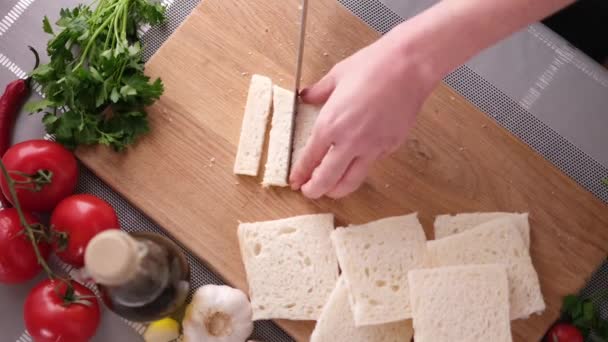 Making Caesar Salad Croutons Slicing Toast Bread — Stock Video