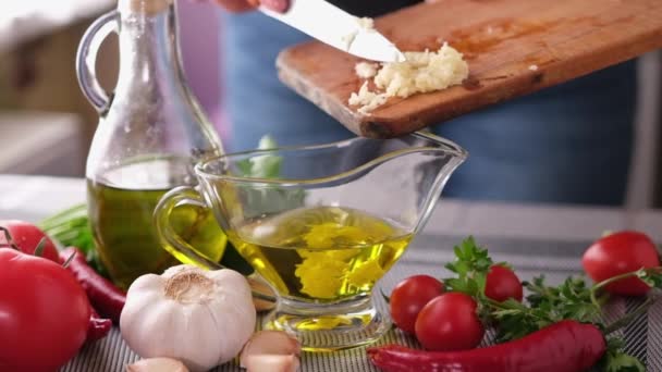 Making Garlic Sauce Pouring Crushed Garlic Olive Oil — Stock Video