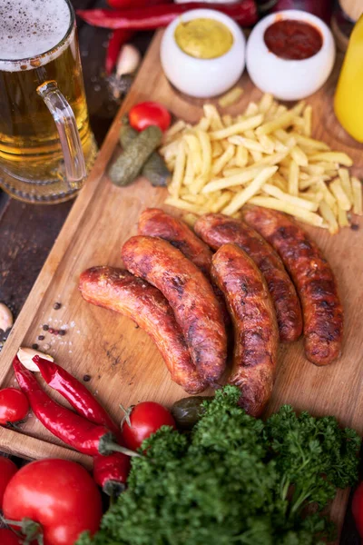 Tasty Freshly Grilled Sausages Served French Fries Sauce Wooden Board — Stock Photo, Image