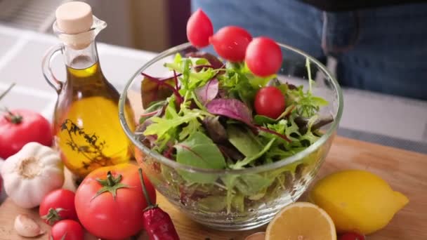 Arugula Salad Leaves Falling Glass Bowl — Stok video