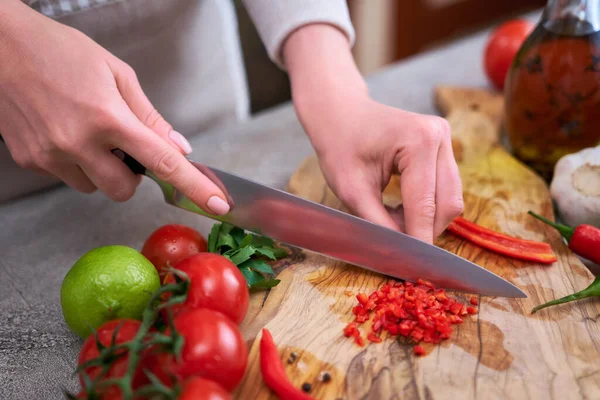 Woman Cutting Chili Pepper Knife Wooden Board — Stock Photo, Image