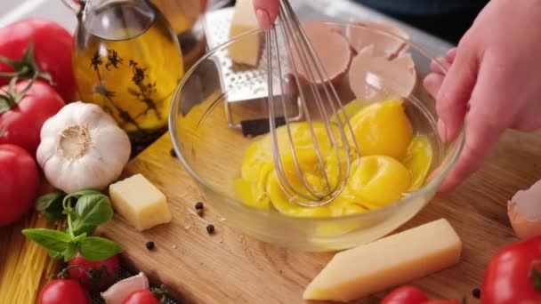 Making Pasta Carbonara Mixing Egg Yolks Glass Bowl Whisk — Stock Video