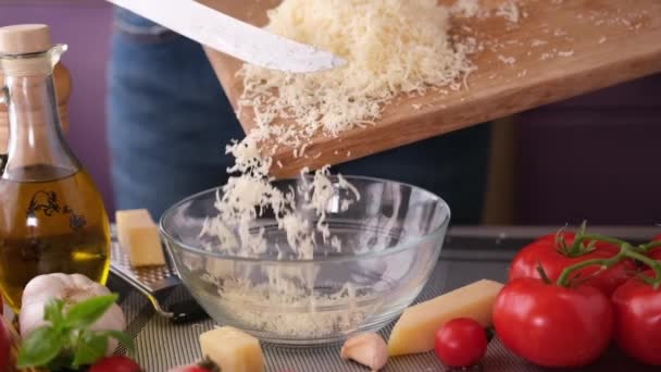 Making Pasta Carbonara Pouring Grated Parmesan Cheese Glass Bowl — Stockvideo