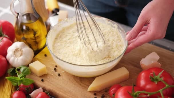 Making Pasta Carbonara Sauce Mixing Grated Parmesan Cheese Cream Glass — Stockvideo