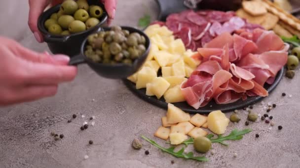 Making Meat Cheese Antipasto Plater Woman Adding Capers Olives Serving — Stock video