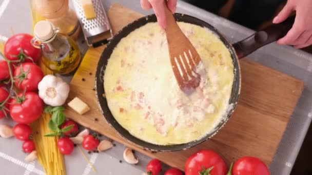 Making Pasta Carbonara Mixing Sauce Made Cream Chopped Pancetta Bacon — стоковое видео