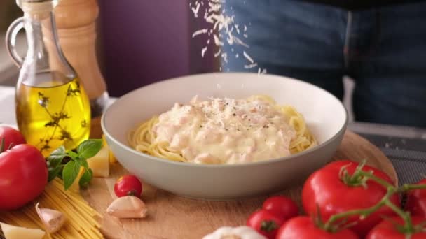 Making Pasta Carbonara Pouring Grated Parmesan Cheese Spaghetti Ceramic Dish — Video