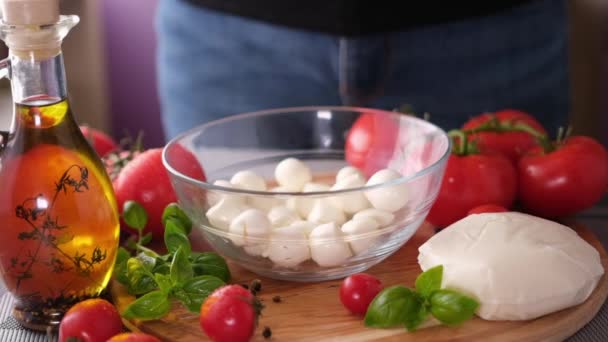 Mozzarella Cheese Small Balls Falling Glass Bowl — Vídeo de Stock