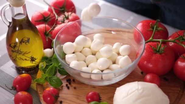 Mozzarella Cheese Small Balls Falling Glass Bowl — Stockvideo