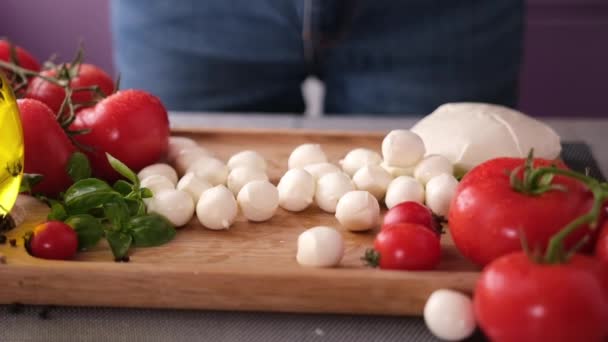 Mozzarella Cheese Small Balls Falling Wooden Cutting Board — Stockvideo