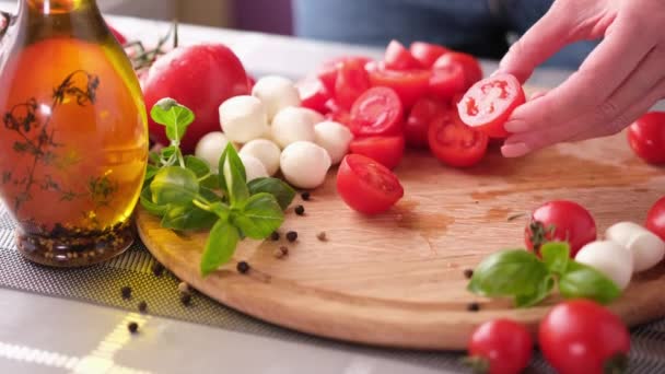 Making Caprese Salad Slicing Cherry Tomatoes Wooden Cutting Board — Vídeo de stock