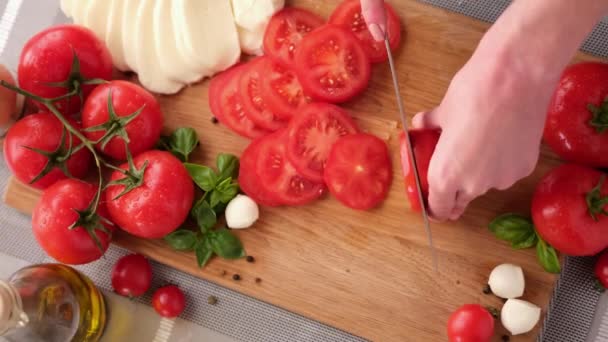 Making Caprese Salad Slicing Ripe Tomatoes Wooden Cutting Board — Stockvideo