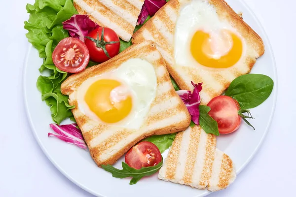 Fried Egg Toasts Heart Shaped Holes White Ceramic Plate — Zdjęcie stockowe