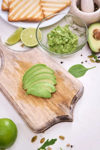 Toasts Preparation Sliced Peeled Mashed Avocados Grilled Toast Bread — Photo