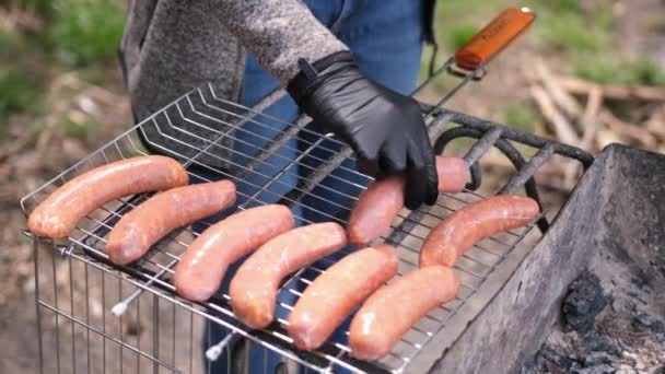 Putting Tasty Sausages Charcoal Grill Grate — Stock Video