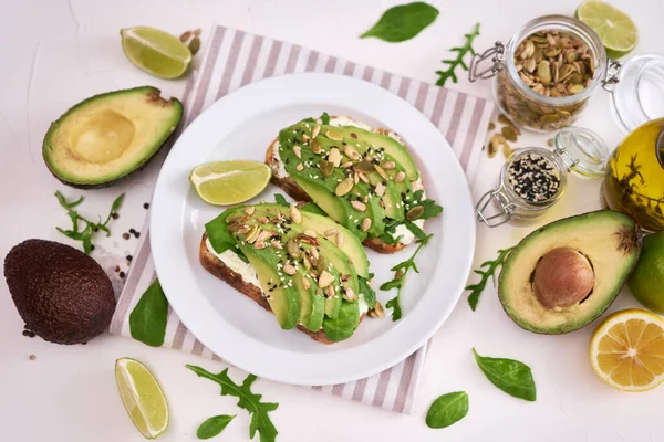 Freshly Made Avocado Cream Cheese Toasts White Ceramic Plate Ingredients — Photo