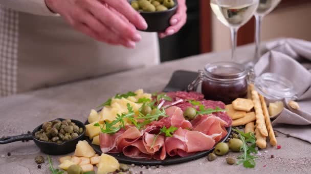 Meat Cheese Plater Domestic Kitchen Woman Puts Olives Serving Board — Stok video