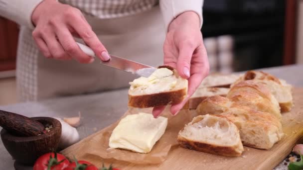 Woman Smearing Soft Butter Slice Baguette Bread Knife Domestic Kitchen — 图库视频影像