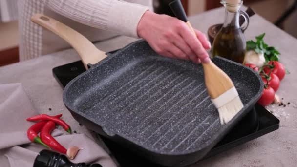 Woman Spreading Cooking Olive Oil Frying Pan Brush — Vídeos de Stock