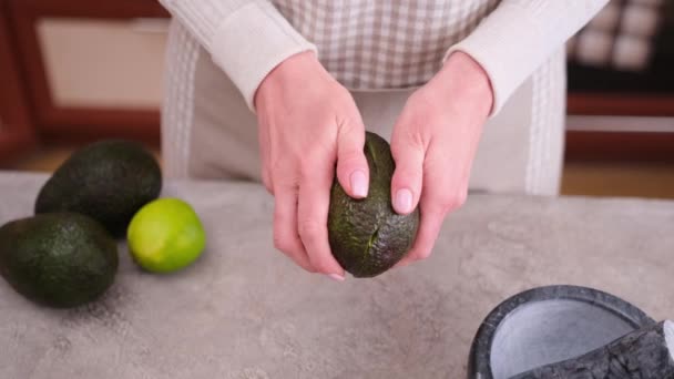 Close Woman Hands Halving Avocado Domestic Kitchen — Stockvideo