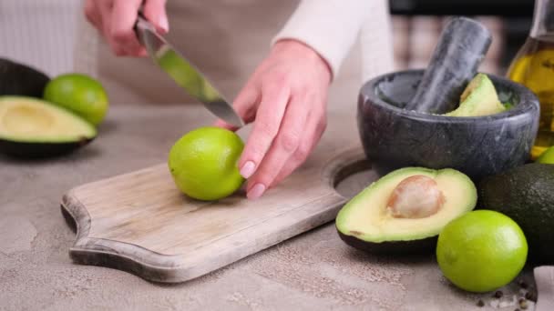 Woman Cut Half Juicy Lime Knife Wooden Cutting Board Domestic — Stok video