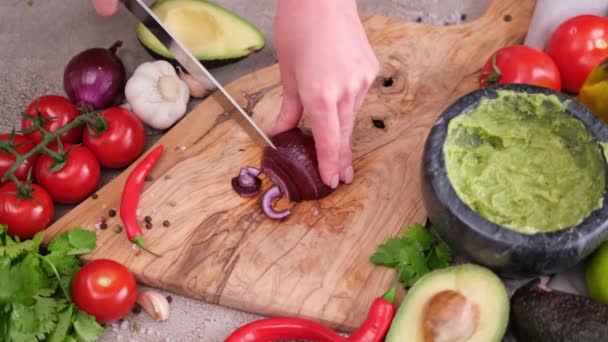 Making Guacamole Sauce Woman Chopping Red Mars Onion Wooden Cutting — Vídeo de stock