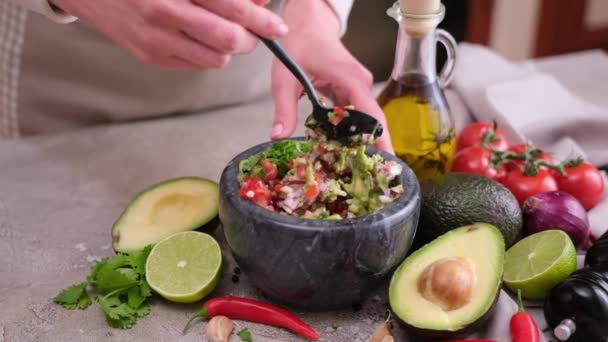 Making Guacamole Sauce Woman Mixing Chopped Ingredients Marble Bowl Mortar — Vídeo de stock