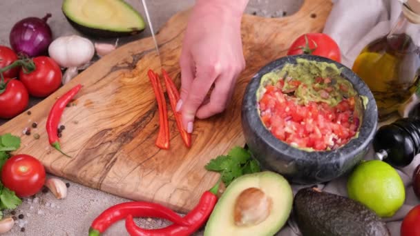 Making Guacamole Sauce Woman Slicing Chili Pepper Wooden Cutting Board — Vídeo de stock