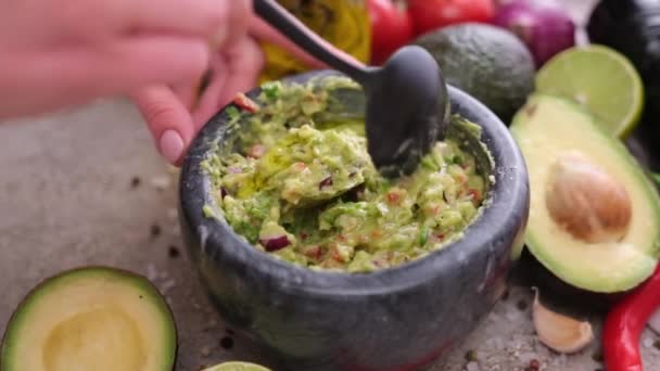 Making Guacamole Sauce Woman Mixing Chopped Ingredients Marble Bowl Mortar — 图库视频影像