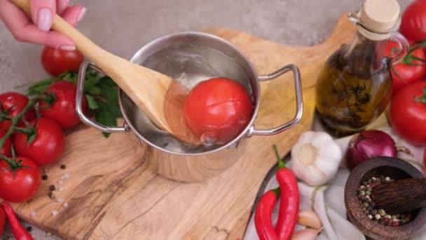 Woman Puts Tomato Pot Hot Boiling Water Blanching — Stok video