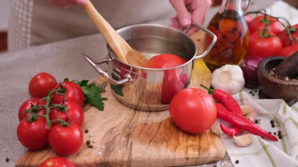Woman Blanching Tomato Pot Hot Boiling Water — Vídeo de Stock
