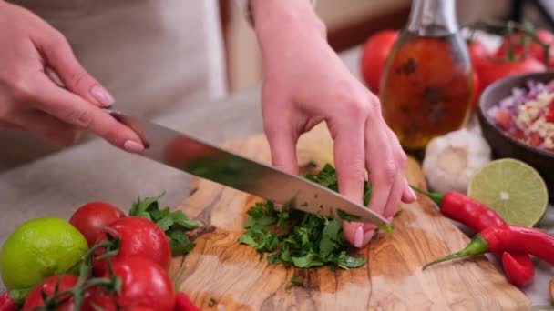Woman Cutting Chopping Cilantro Parsley Greens Wooden Board — Stockvideo