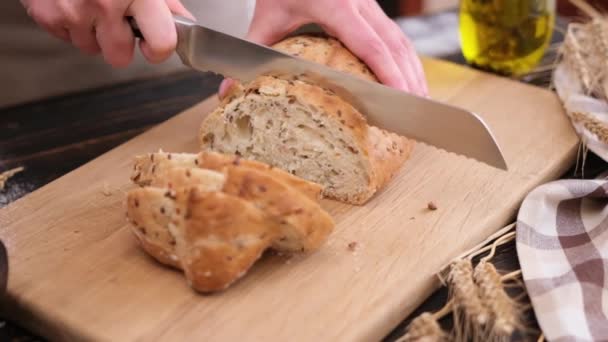 Woman Slicing Bread Wooden Cutting Board — Stockvideo