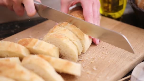 Woman Slicing Fresh Baguette Bread Wooden Cutting Board — Wideo stockowe
