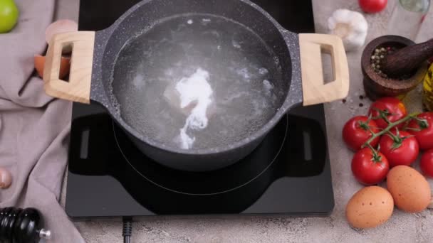Poached Egg Uncooked Egg Spinning Boiling Water — Stock Video