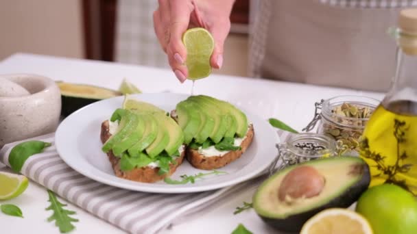 Woman Prepares Healthy Breakfast Snack Soft Cheese Sandwich Avocado — Video