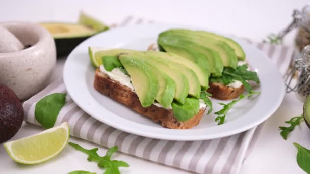 Healthy Breakfast Snack Soft Cheese Avocado Sandwich Plate — Stockvideo