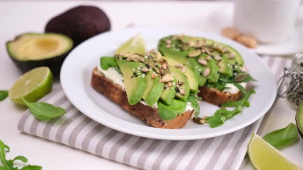 Healthy Breakfast Snack Soft Cheese Avocado Sandwich Plate — Stockvideo