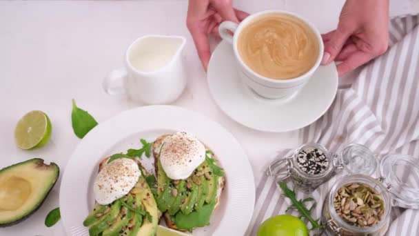 Healthy Breakfast Woman Puts Cup Coffee Table Poached Egg Soft — Video