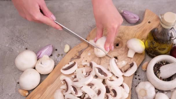 Woman Cuts Champignon Mushrooms Knife Wooden Cutting Board — Αρχείο Βίντεο