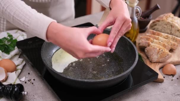 Woman Breaks Egg Hot Frying Pan Stove — Stok video