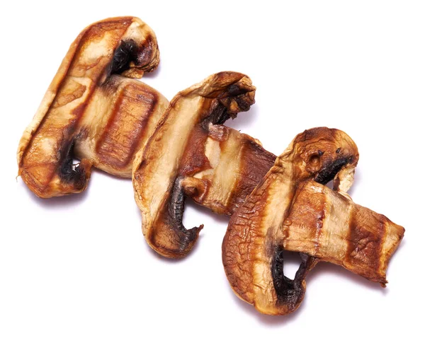Dipanggang Potongan Jamur Champignon Dengan Garis Garis Dari Panggangan Terisolasi — Stok Foto