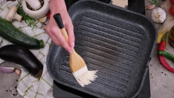 Woman Spreading Oil Grill Frying Pan Silicone Brush — Stock Video