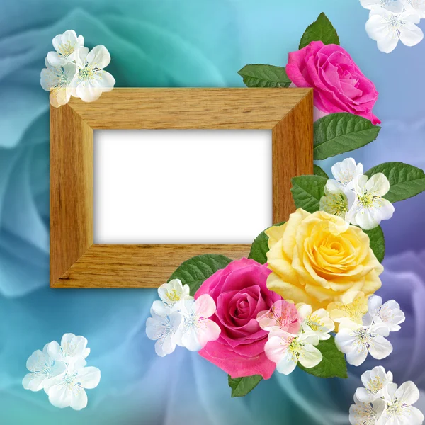 Wooden photo frame with roses — Stock Photo, Image