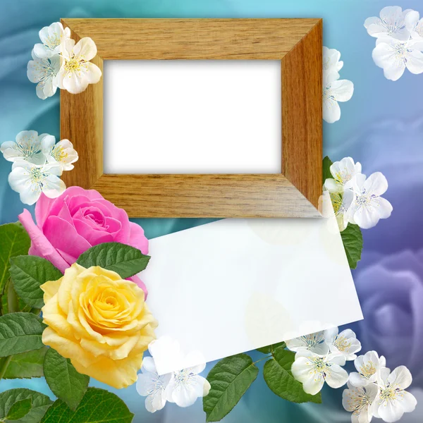 Wooden photo frame with roses — Stock Photo, Image