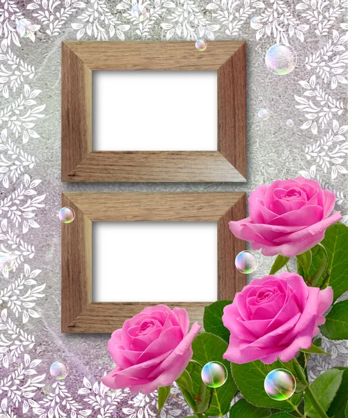 Roses and wooden frame — Stock Photo, Image