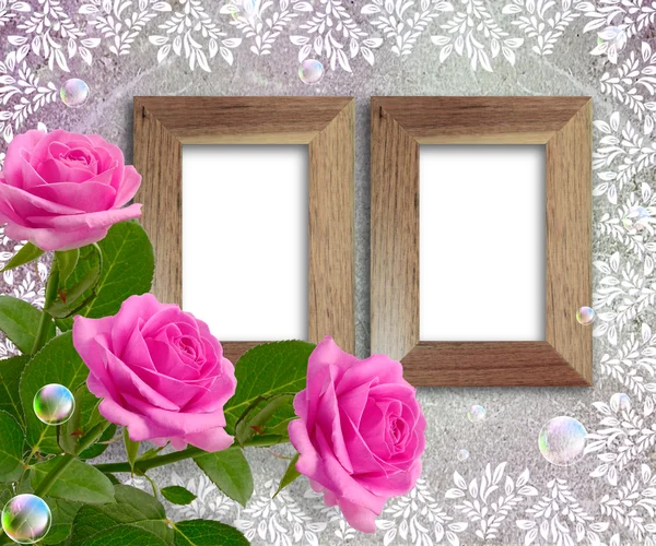 Roses and wooden frame — Stock Photo, Image